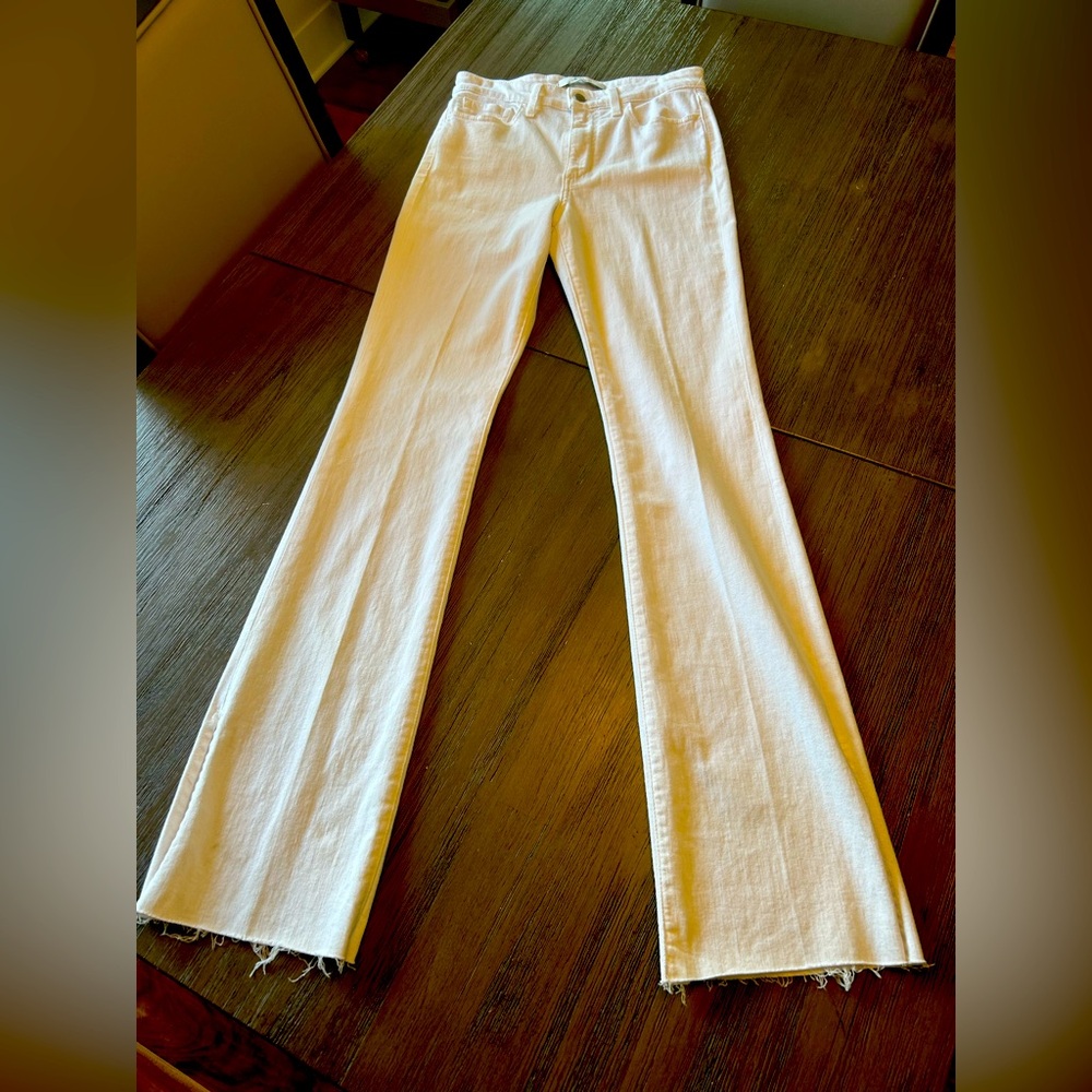 Joes White High Waisted Flare Jeans. NWOT..  Side slit 6” raw hem 33 1/2” inseam